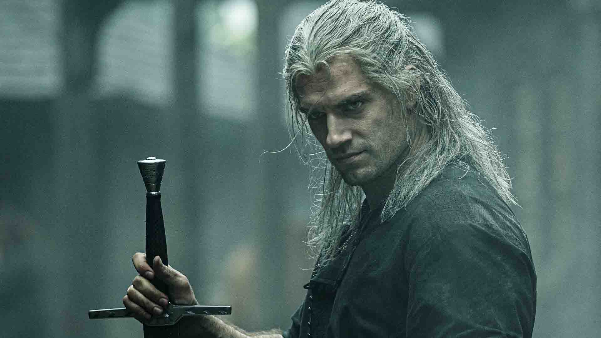 The Witcher TV series — Geralt scowls at the camera, sword in hand.