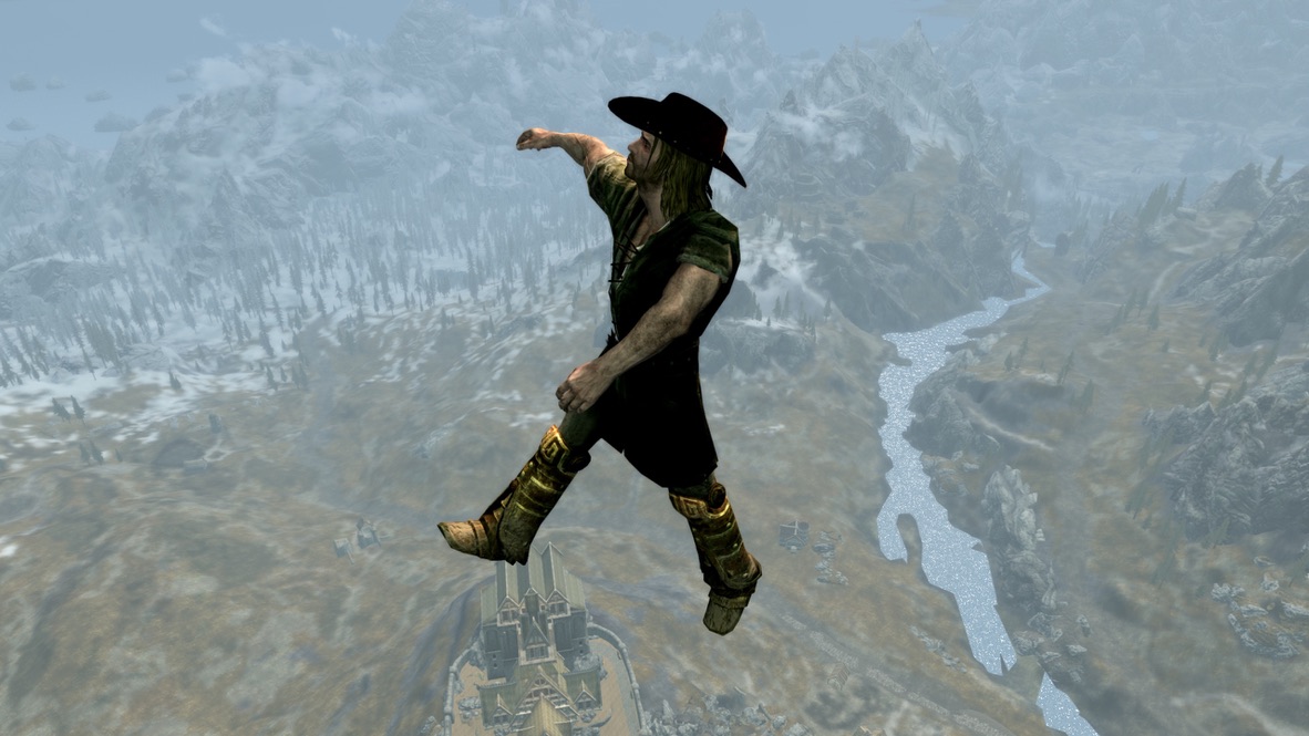 A nord in a cowboy hat thousands of feet above Skyrim.